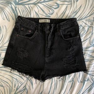 Distressed black shorts